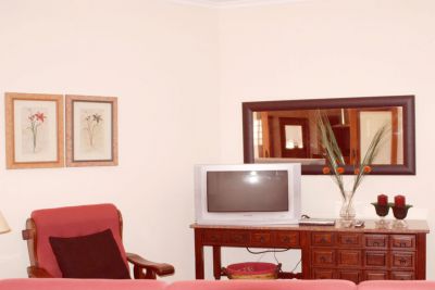 Ferienhaus Madeira 051 Wohnzimmer mit Couchecke und TV