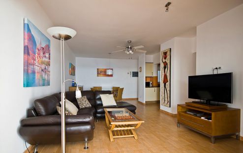Ferienwohnung Morro Jable F-019 Wohnraum mit Couch und SAT-TV