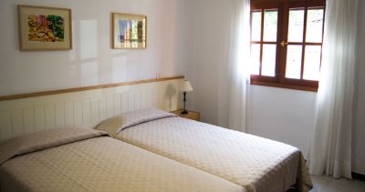 Schlafzimmer mit Doppelbett / Ferienwohnung G-014 Bild 3