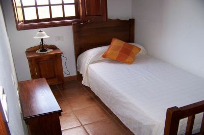 Schlafzimmer mit Einzelbett in Puntallana