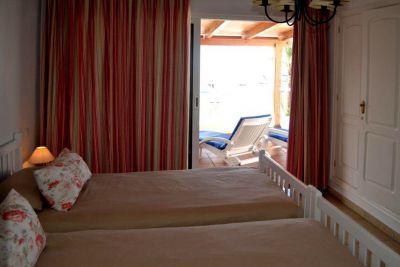 Ferienwohnung Schlafzimmer mit einem Doppelbett