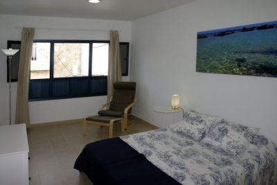 Schlafzimmer mit zusammengestellten Einzelbetten