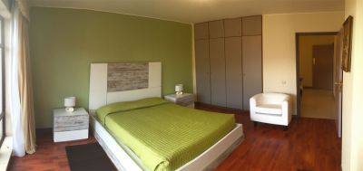 MAD-114 Ferienwohnung in Funchal Schlafzimmer mit Doppelbett und Schrank