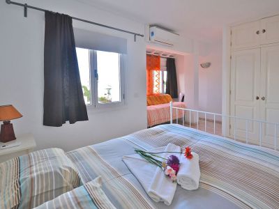 Ferienwohnung F-004 Schlafzimmer mit Doppelbett