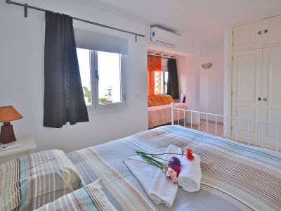 Ferienwohnung F-004 Schlafzimmer mit Doppelbett