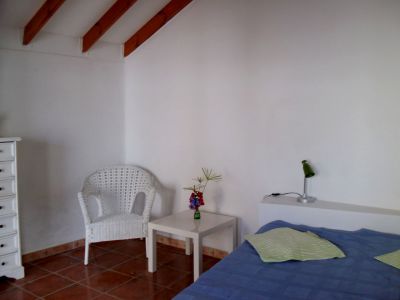 Ferienhaus El Guro - Schlafzimmer mit Sessel