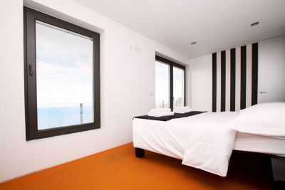 Villa MAD - 054 Schlafzimmer mit Doppelbett Bild 3