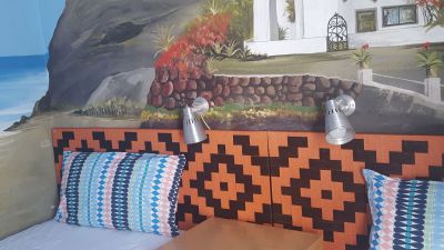 Ferienhaus G-056 Schlafzimmer mit Doppelbett