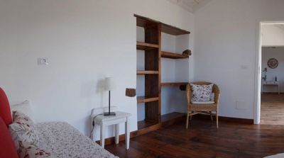 Schlafzimmer mit Einzelbett und Regal Ferienhaus La Palma P-221