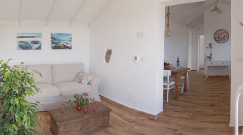 Ferienhaus La Palma P-221 Wohnraum mit Couch