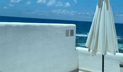 Gran Canaria Ferienhaus am Meer G-142 - Terrasse mit Sonnenschirm