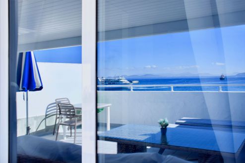 Playa Blanca Ferienwohnung direkt am Strand - Balkon mit Meerblick