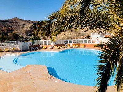 G-060 Ferienhaus am Meer Gemeinschaftspool mit Palme