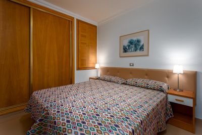 Ferienwohnung G - 015 Schlafzimmer mit Doppebett