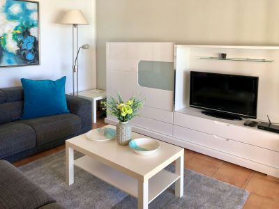 Ferienhaus TFS - 111 Wohnzimmer mit SAT-TV