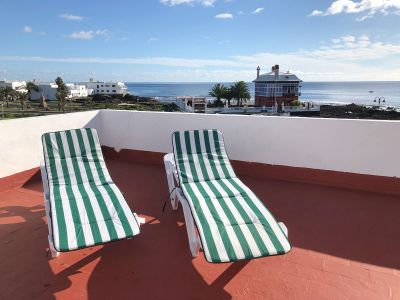 Ferienhaus direkt am Meer L-223 Dachterrasse mit Sonnenliegen